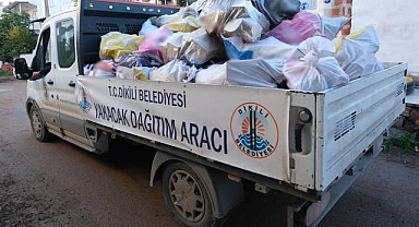Dikili'de Budanan Ağaçlar Yakacak Yardımı Olarak Dağıtılıyor